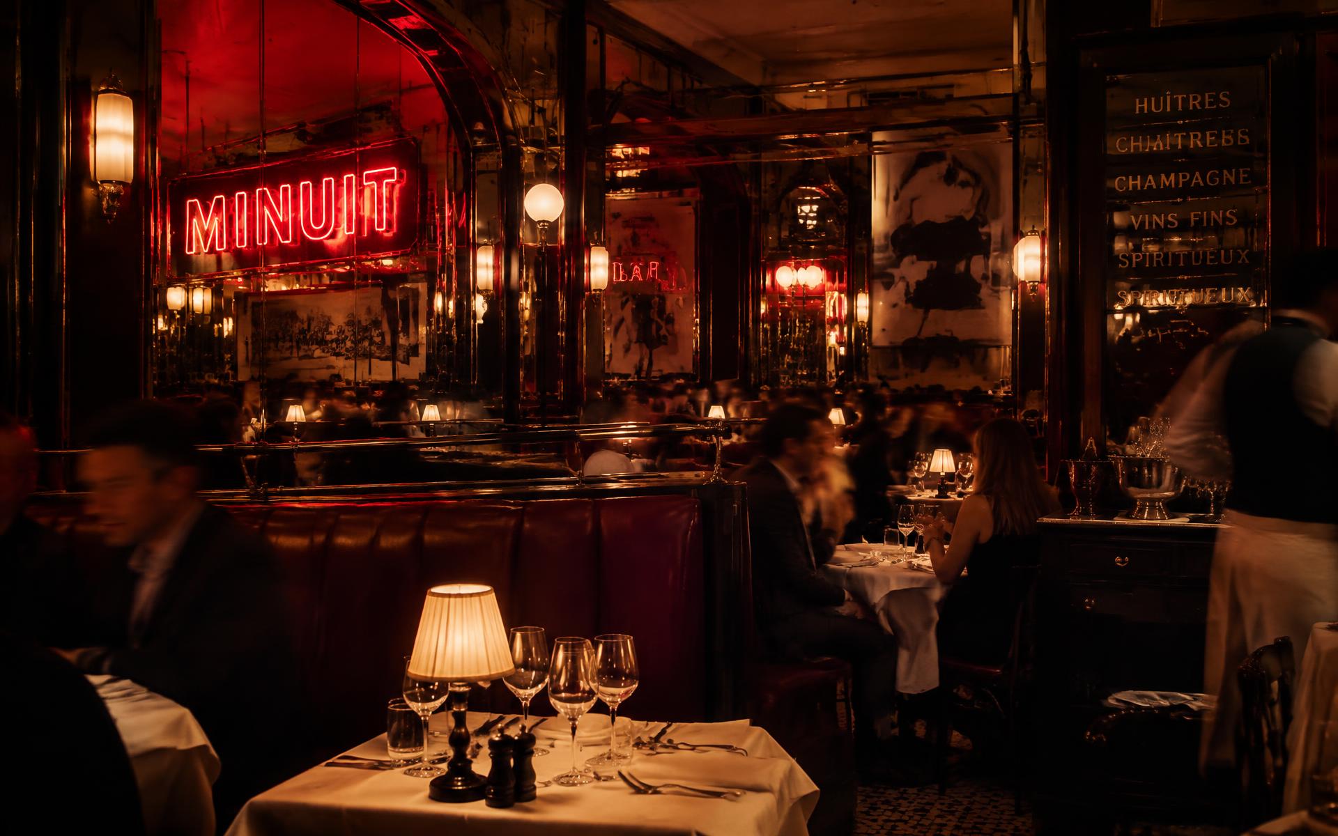 The Odeon restaurant website, with its red neon Tribeca dining room